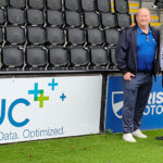 Paul Gow and Mick Livesey by Pitch side CJC signage at Bromley FC 2
